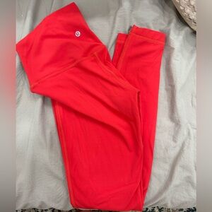 Lululemon Aligns. Size 6 25inch. Not sure on color. Pretty red color.